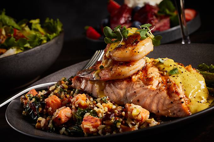 Salmon with sides and salad